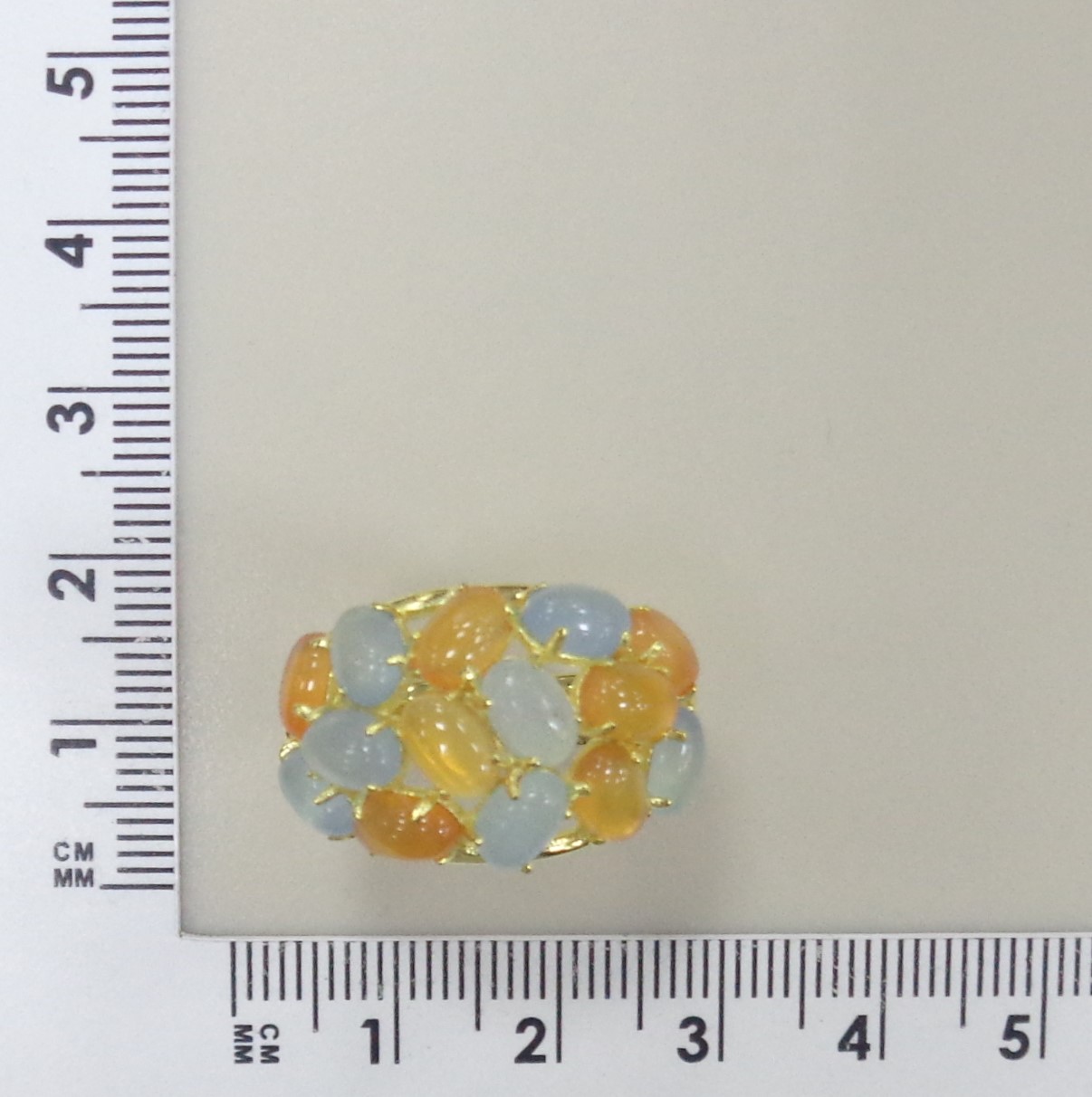 Серебряное кольцо с аквамаринами и халцедонами